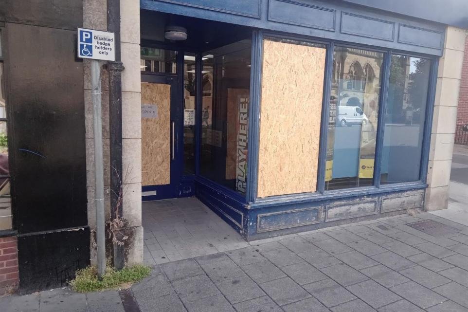 Smashed bookmakers window